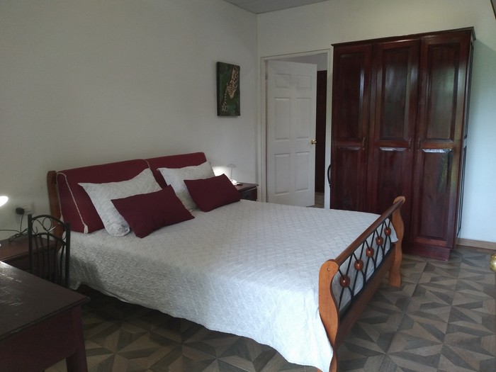 view of bed and closet